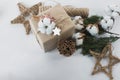 Christmas decorations eco cotton flowers, cinnamon,stars, spruce branches and jute rope hank over white background,holiday,xmas,ch Royalty Free Stock Photo