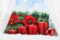 Christmas decorations with four advent candles on the window sil Royalty Free Stock Photo