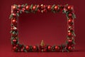 christmas decorations with a frame on a red background.