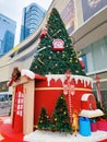 Christmas decorations in front of a large shopping mall with skyscrapers in the background in Shenzhen. Royalty Free Stock Photo