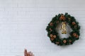 Christmas decorations garland on white interior wall. Christmas festival card background and have copy space for text.