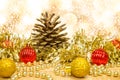 Christmas decorations in gold and red balls and pineapple with gold tree decorations. Background christmas. Light bokeh background Royalty Free Stock Photo