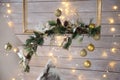 Christmas decorations, golden balls and lights on wooden background Royalty Free Stock Photo