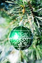 Christmas decorations green ball at xmas tree outdoor.
