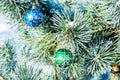 Christmas decorations green and blue balls at xmas tree.