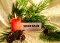 Christmas decorations, green needles, colorful ornaments, text 2023, Merry Christmas