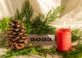 Christmas decorations, green needles, colorful ornaments, text 2023, Merry Christmas