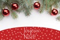 Christmas decorations with the greeting in French `Joyeux NoÃÂ«l` Merry Christmas!