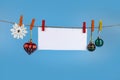 Christmas decorations hang on a rope. Christmas card Royalty Free Stock Photo