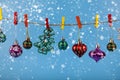 Christmas decorations hang on a rope. Christmas card Royalty Free Stock Photo