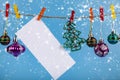 Christmas decorations hang on a rope. Christmas card Royalty Free Stock Photo