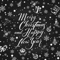 Christmas decorations with holiday lettering on black chalkboard