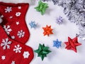Christmas decorations for the house with your own hands. Bright snowflakes made of paper, Christmas stockings.