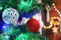 Christmas decorations hung on the Christmas tree. Merry Christmas Royalty Free Stock Photo