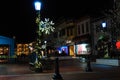 Christmas decorations lighten an outdoor mall