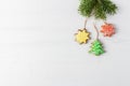 Christmas decorations made of homemade gingerbread stars and fir branch