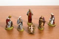 Christmas decorations, nativity scene statues on a wood table