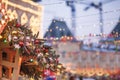 Christmas decorations and New Year tree with colorful lights on a city street during the festive winter fair. Concept of christmas Royalty Free Stock Photo