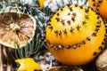 Christmas decorations and oranges on a wooden table