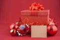 Christmas decorations and paper card on vintage red bac Royalty Free Stock Photo