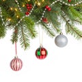 Christmas decorations on pine branches isolated on white background Royalty Free Stock Photo