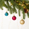 Christmas decorations on pine branches isolated on white background Royalty Free Stock Photo