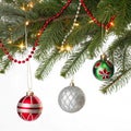 Christmas decorations on pine branches isolated on white background Royalty Free Stock Photo
