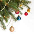 Christmas decorations on pine branches isolated on white background Royalty Free Stock Photo