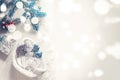 Christmas decorations are ready to dress up the Christmas tree. Christmas decor with toys, garlands and fir branches. Bokeh and Royalty Free Stock Photo