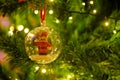 Christmas Decorations, Santa Claus inside transparent ball, xmas tree lights Royalty Free Stock Photo