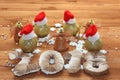 Christmas decorations, Santa`s hats on balls, the new year 2018, wooden background Royalty Free Stock Photo