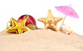 Christmas decorations seashells and starfish on a beach sand on Royalty Free Stock Photo