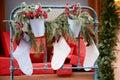 Christmas decorations socks and coniferous twigs Royalty Free Stock Photo