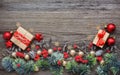 Christmas decorations and spruce branches on a wooden table. Top view, copy space. Christmas or New Year greeting card Royalty Free Stock Photo