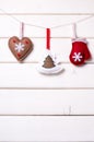 Christmas decorations with stars and tree on white wooden background. Xmas and Happy New Year composition. Vertical. Royalty Free Stock Photo