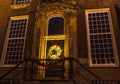 Christmas decorations on streets of night Amsterdam.