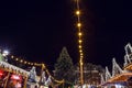 Christmas decorations on streets of night Amsterdam.