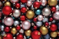 Christmas decorations, top view of pile of glass colored balls, useful as a greeting gift card background Royalty Free Stock Photo