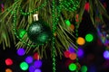 Christmas decorations. Christmas tree. Green branches. Multicolored bokeh