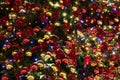 Christmas decorations on the Christmas tree texture. Royalty Free Stock Photo