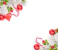 Christmas decorations. Winter fir branches, sweets, berries and red glass baubles isolated on white background. Xmas corner Royalty Free Stock Photo