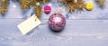 Christmas decorations wooden background top view. Tips for preparing christmas in advance. Decorative ball toy and gift Royalty Free Stock Photo