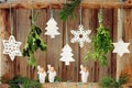 Christmas decorations on wooden fence