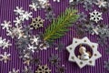 Christmas decorative background, snowflakes and angel on violet Royalty Free Stock Photo