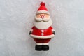 Christmas doll of santa claus on top of snow Royalty Free Stock Photo