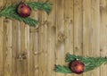 Christmas decored branches on wood background Royalty Free Stock Photo
