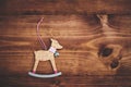 Christmas deer ornament on wooden background Royalty Free Stock Photo