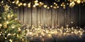 Christmas - Defocused String Light On Rustic Wooden Table