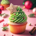 Christmas delicious cupcake with green whipped cream and star on pink background. Xmas homemade dessert