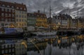 Christmas deocorations reflect in Copenhagen Nyhavn canal